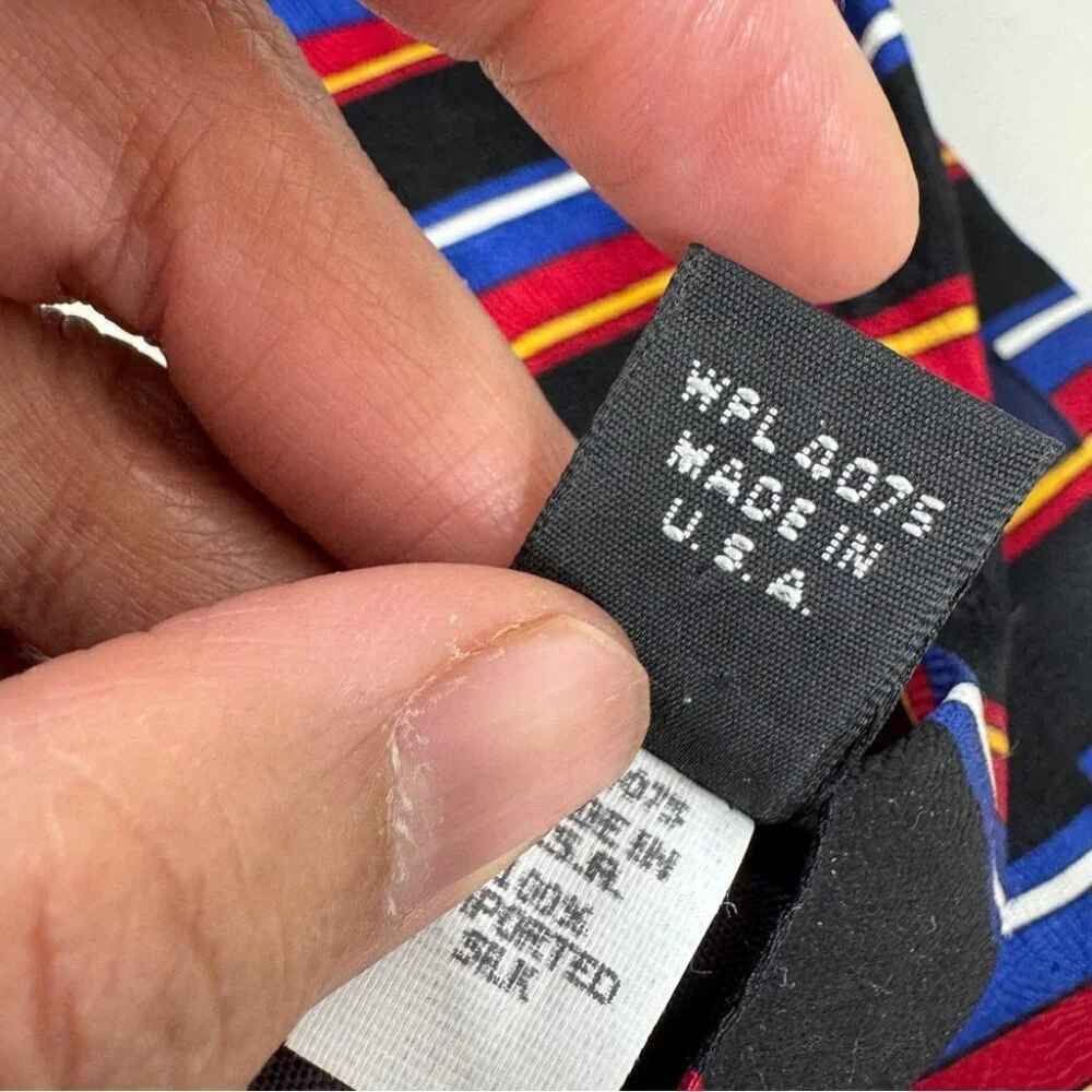 VTG Oscar de la Renta Striped Black Tie with Red and Blue Accents Textured